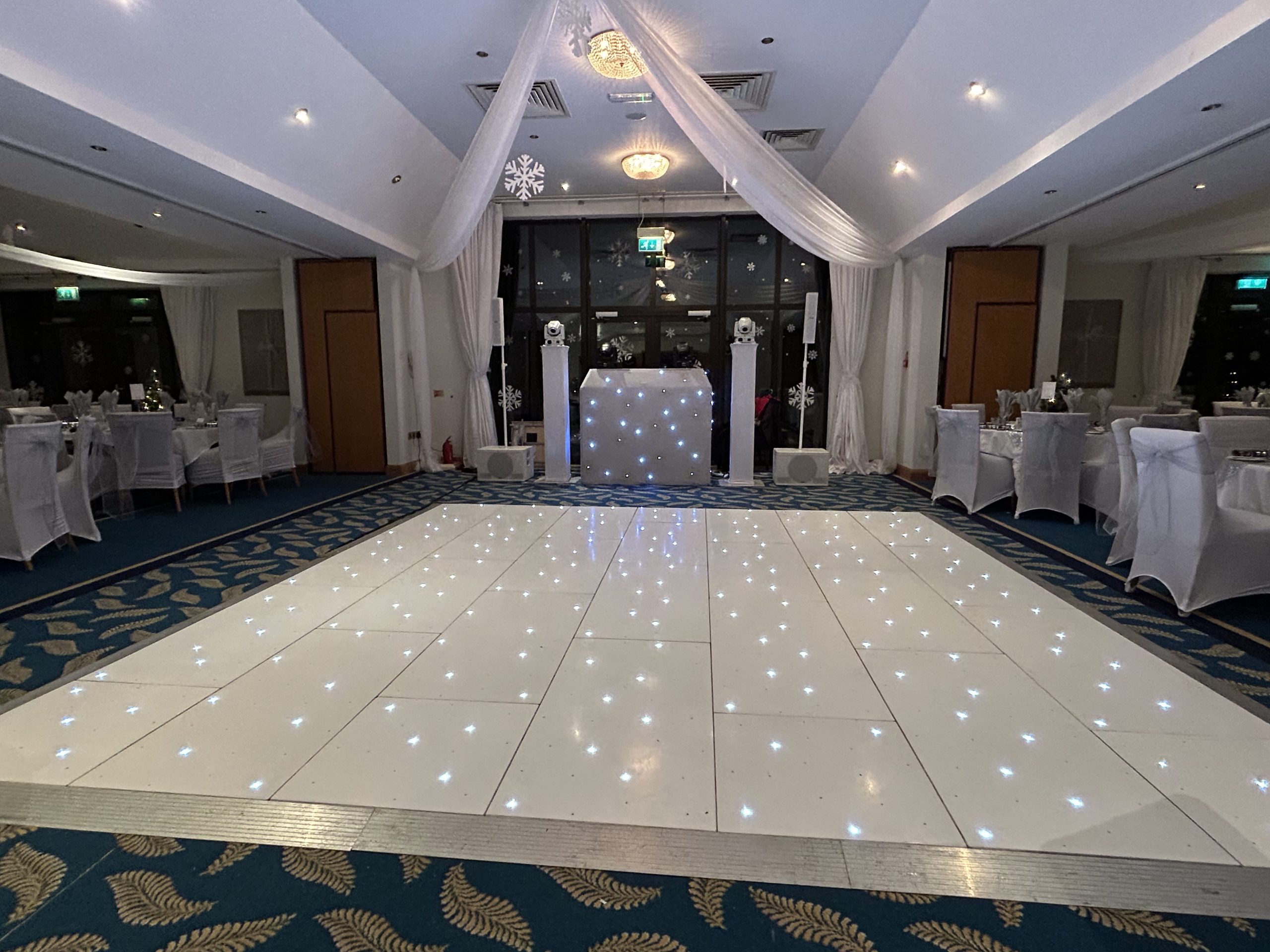 sdc-floor White LED dance floor set up in a wedding reception room